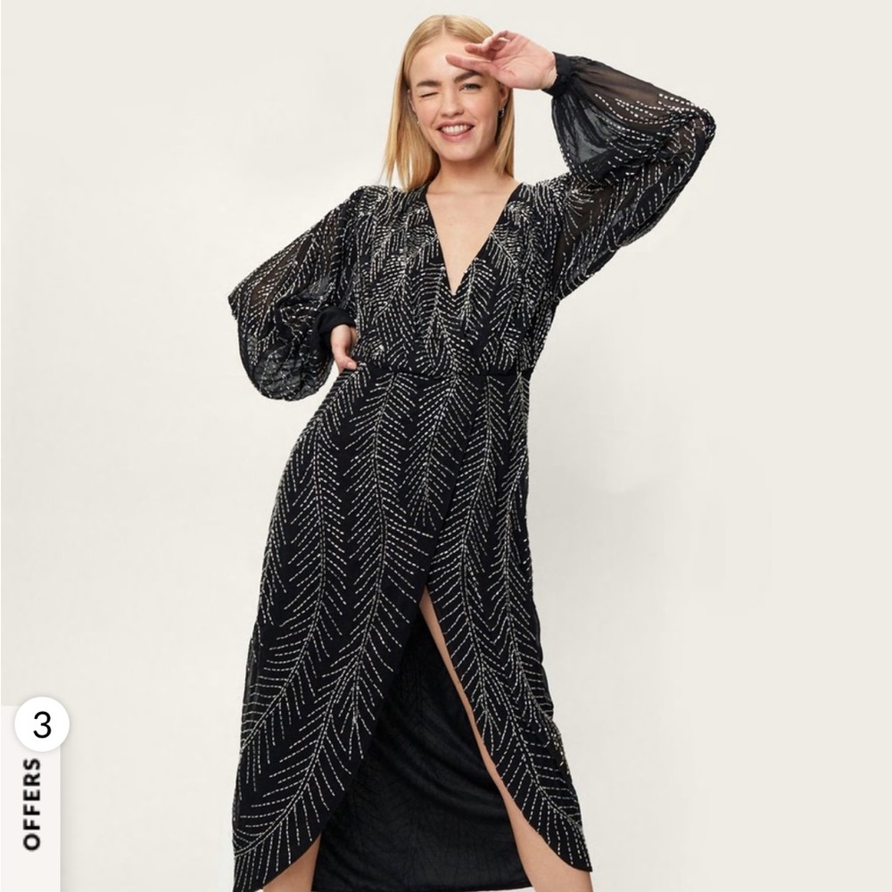 Dress is true to the pictures, slit does come high and some weight from beads.